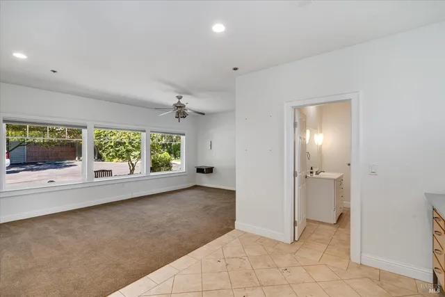 a kitchen with stainless steel appliances granite countertop a stove and a sink