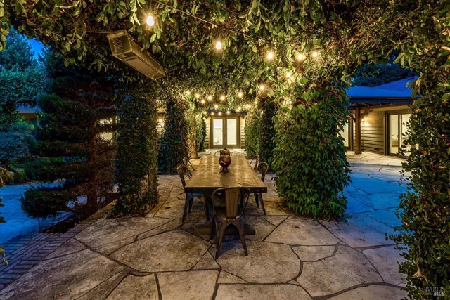 a view of a bench in backyard