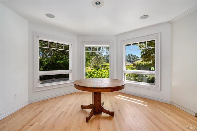a view of livingroom with furniture wooden floor and window