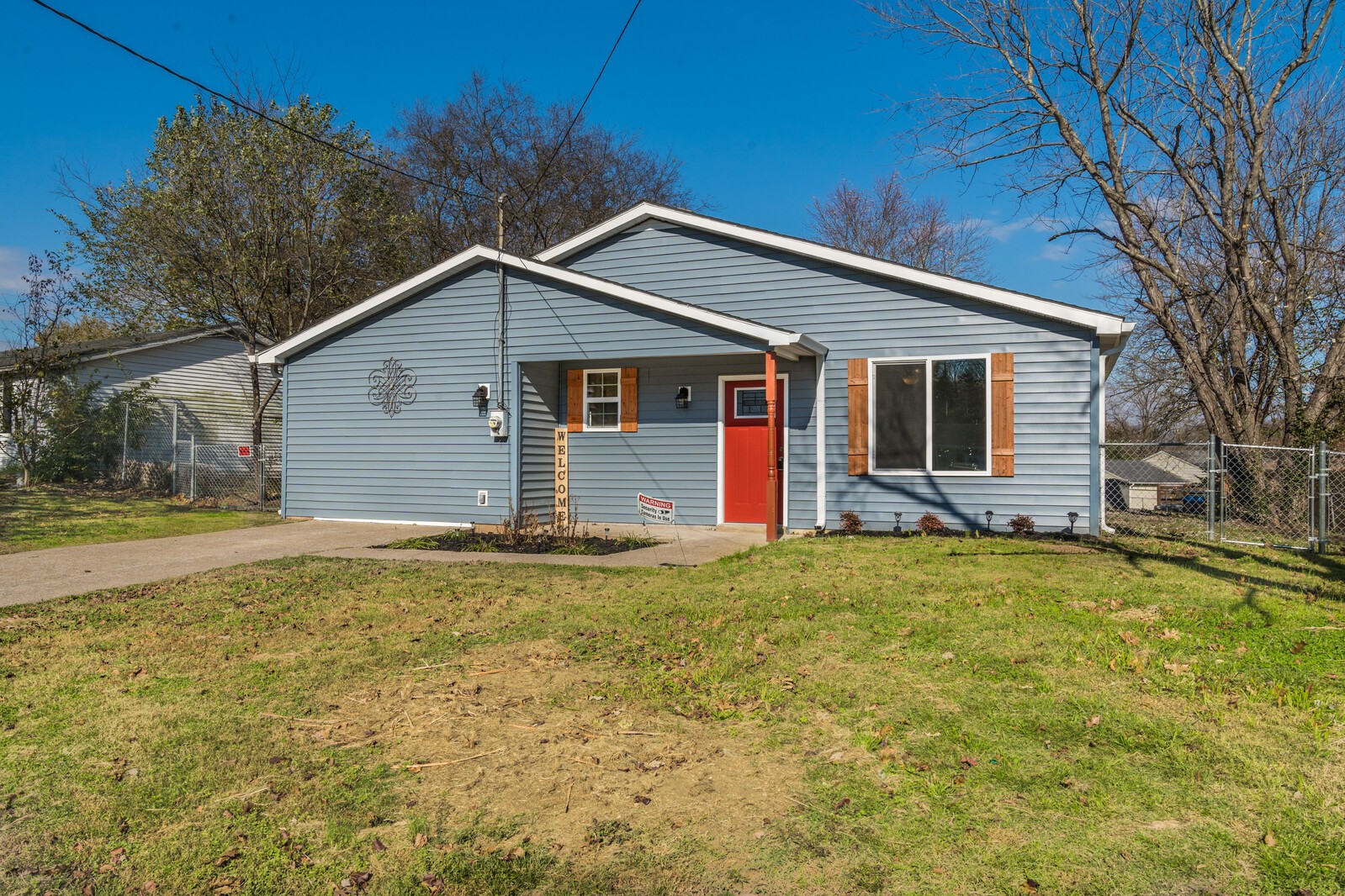 209 Manzano Road Madison, TN 37115 - Photo 1 of 15 a backyard of a house