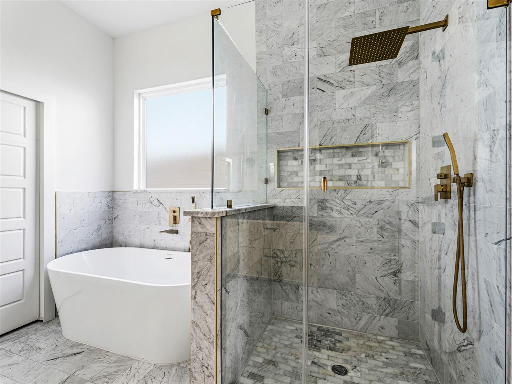 1958 Toronto Street Dallas, TX 75212 - Photo 12 of 32 a bathroom with a bathtub and shower