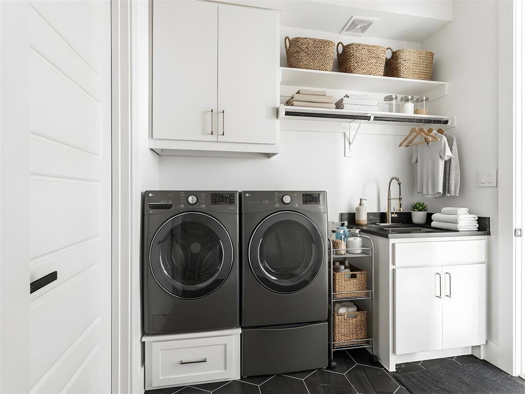 1958 Toronto Street Dallas, TX 75212 - Photo 17 of 32 a utility room with dryer and washer