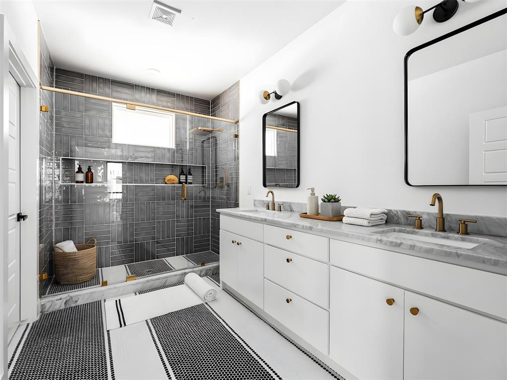 1958 Toronto Street Dallas, TX 75212 - Photo 24 of 32 a bathroom with a granite countertop double vanity sink a mirror and a shower