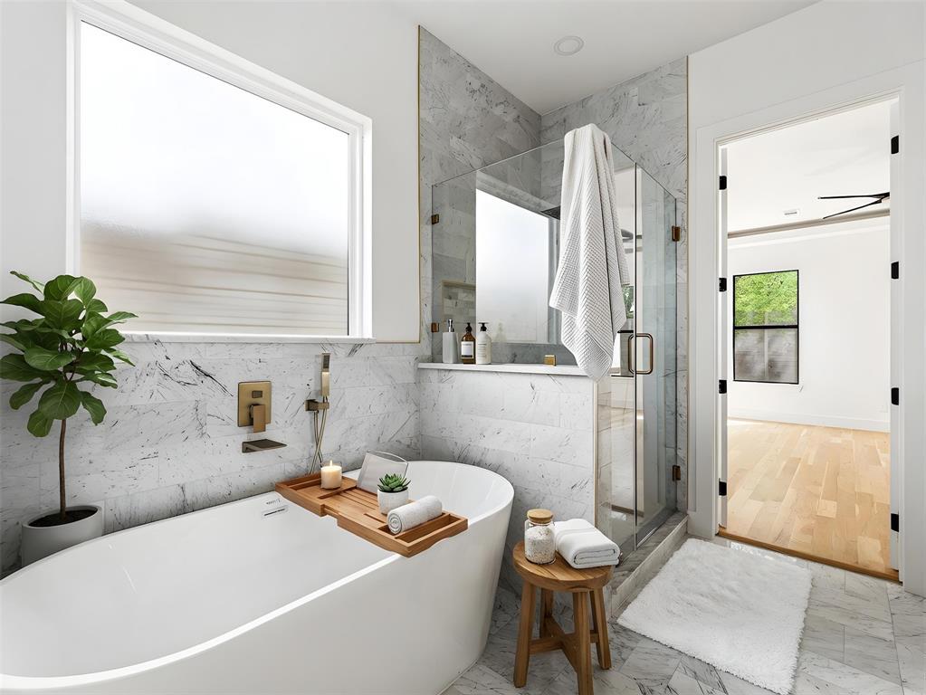 1958 Toronto Street Dallas, TX 75212 - Photo 10 of 32 a bathroom with a tub a potted plant and a sink