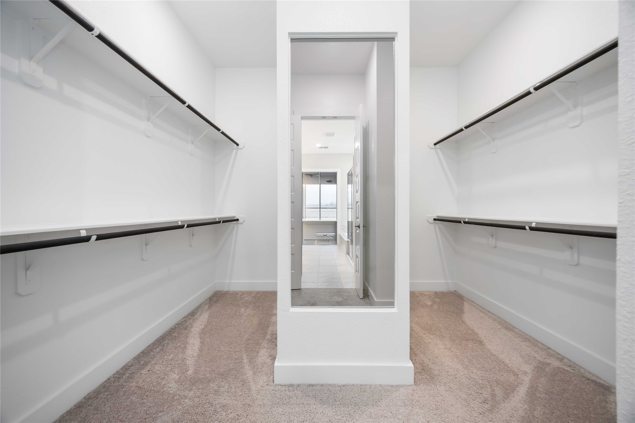 32022 Western Grv Lane Fulshear, TX 77441 - Photo 24 of 49 a view of walk in closet with empty racks
