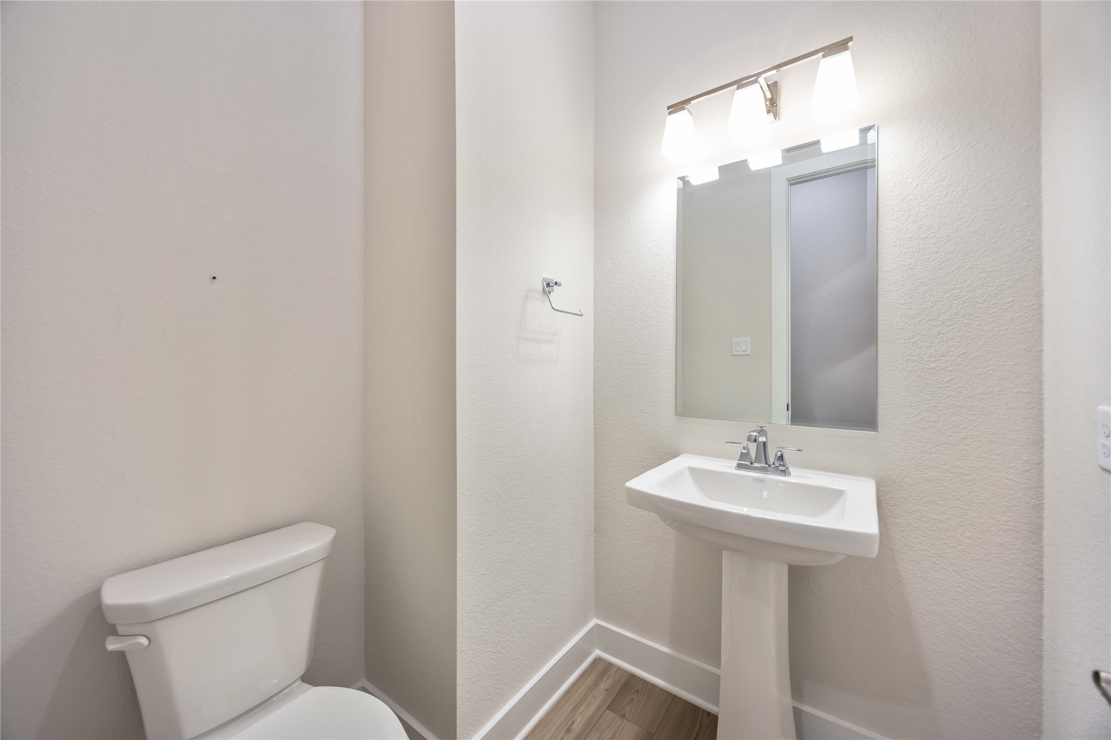 32022 Western Grv Lane Fulshear, TX 77441 - Photo 30 of 49 a bathroom with a sink a toilet and mirror