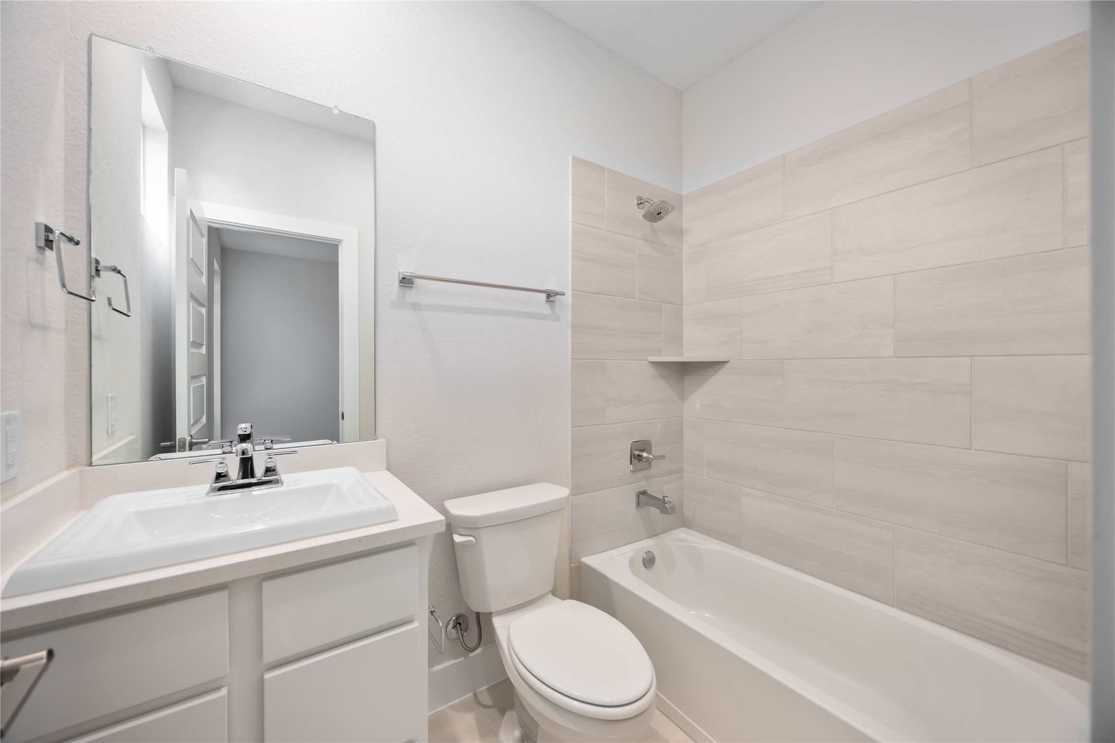32022 Western Grv Lane Fulshear, TX 77441 - Photo 36 of 49 a bathroom with a sink a toilet and a bathtub