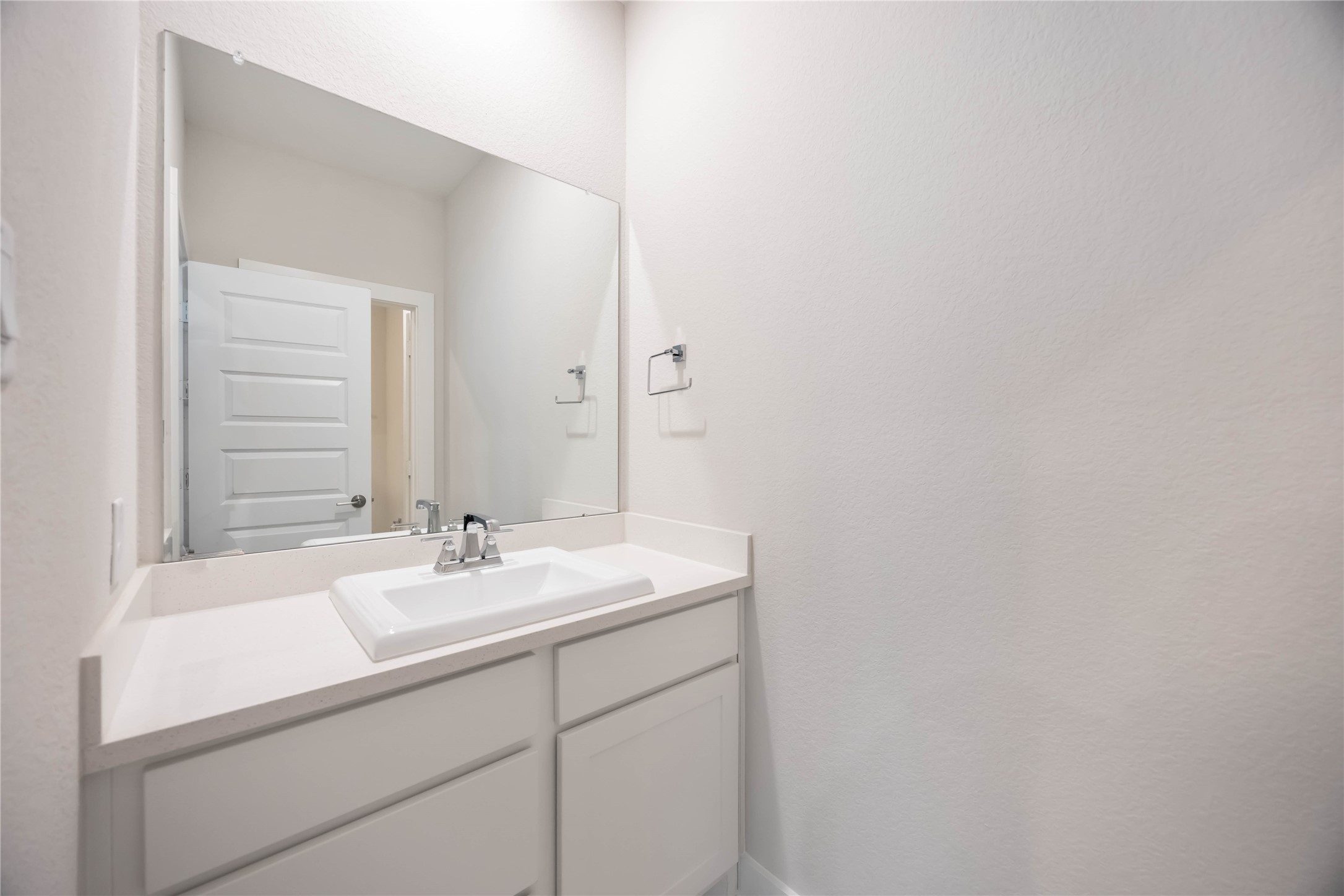 32022 Western Grv Lane Fulshear, TX 77441 - Photo 37 of 49 a bathroom with a sink and a mirror