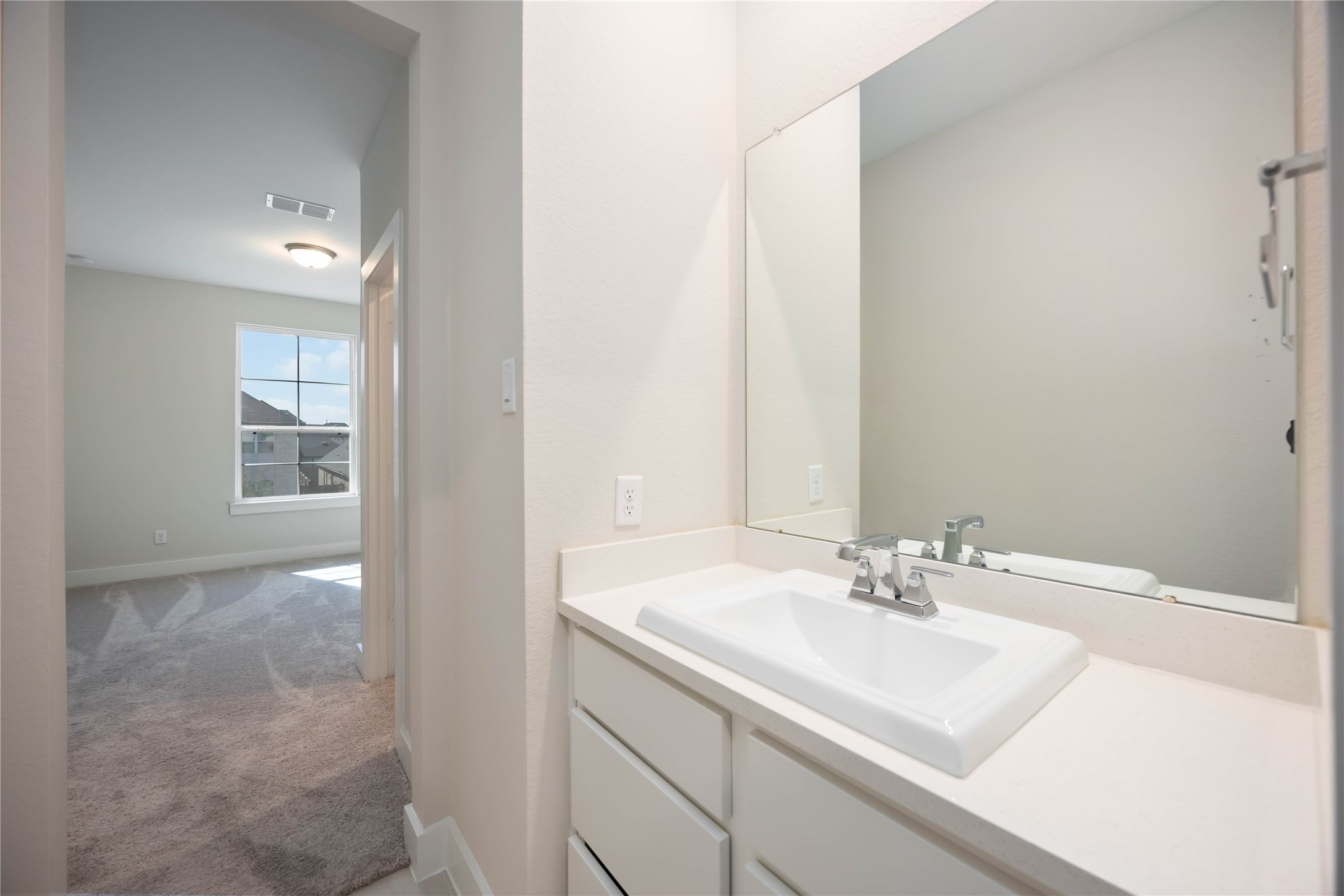 32022 Western Grv Lane Fulshear, TX 77441 - Photo 39 of 49 a bathroom with a sink and a mirror