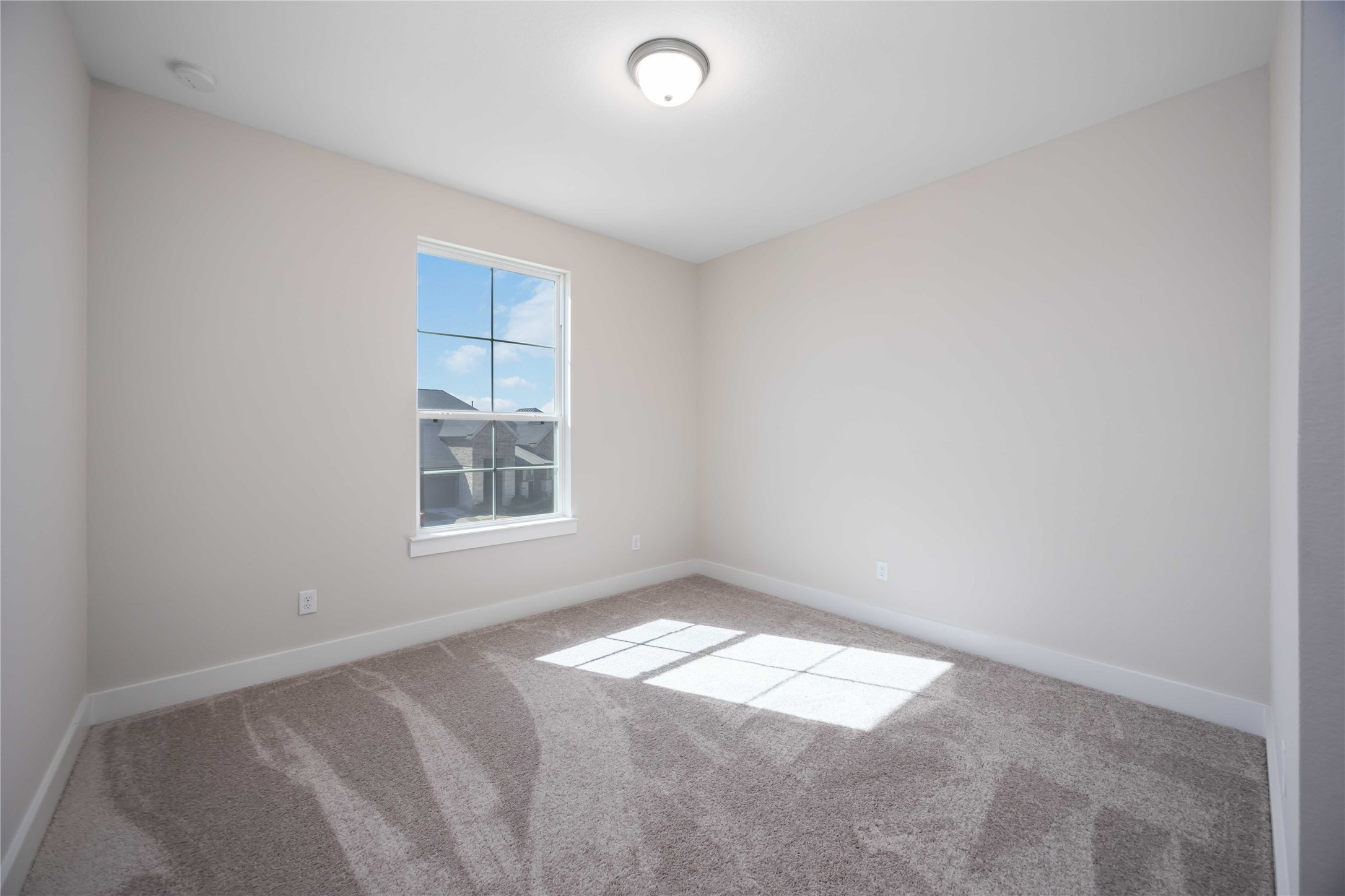 32022 Western Grv Lane Fulshear, TX 77441 - Photo 40 of 49 an empty room with a window