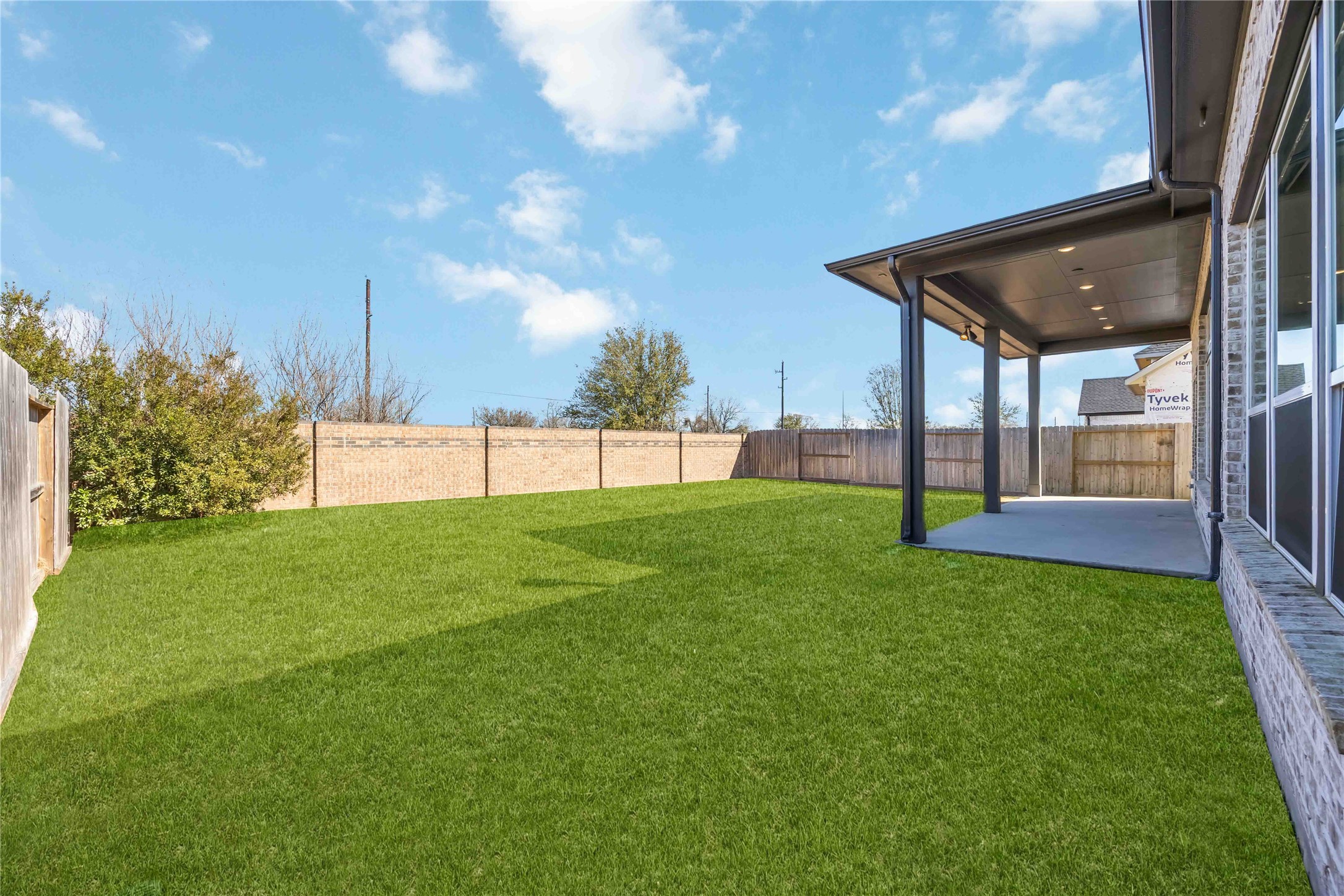 32022 Western Grv Lane Fulshear, TX 77441 - Photo 46 of 49 a view of yard with grass and a fence