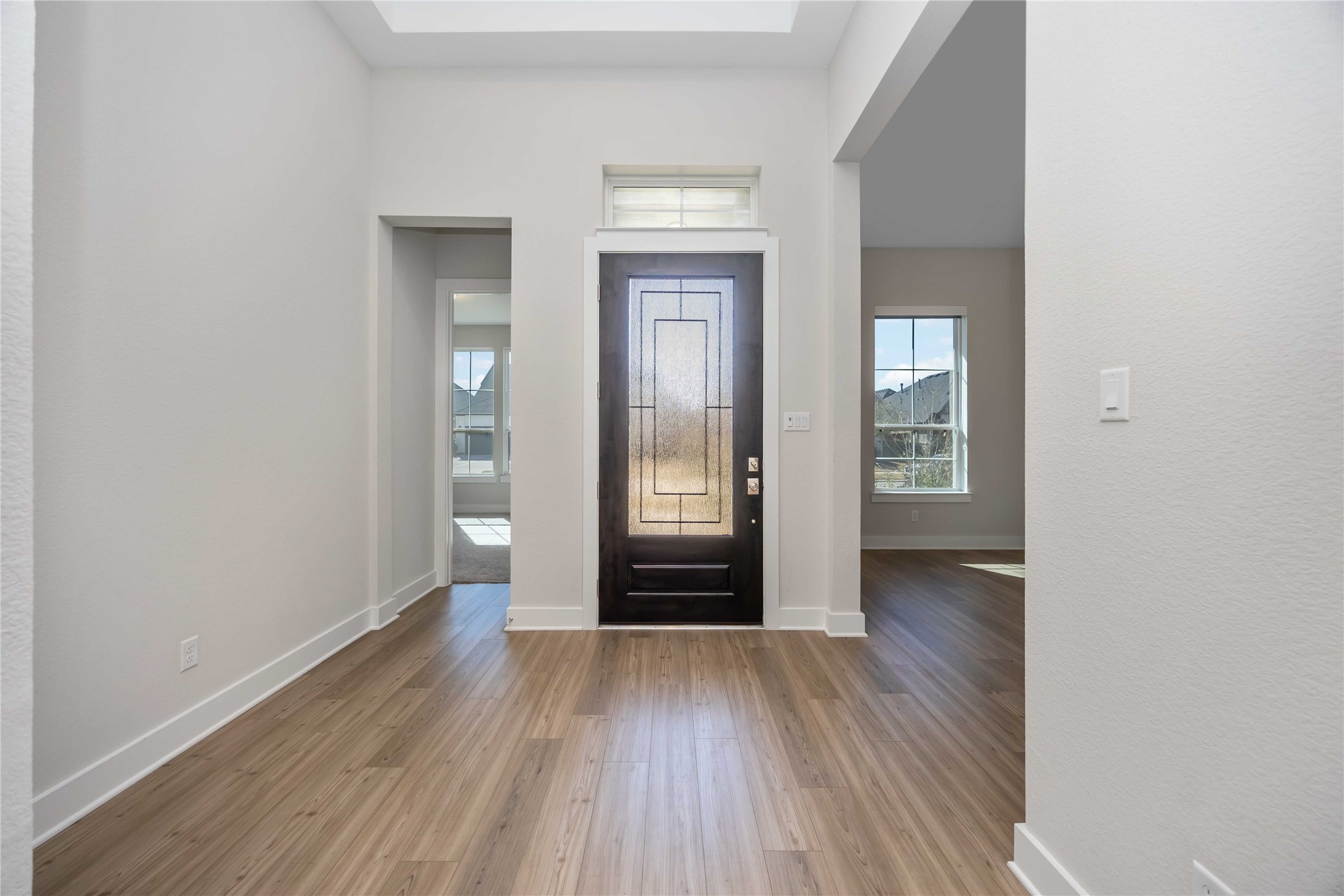 32022 Western Grv Lane Fulshear, TX 77441 - Photo 5 of 49 an empty room with wooden floor and closet