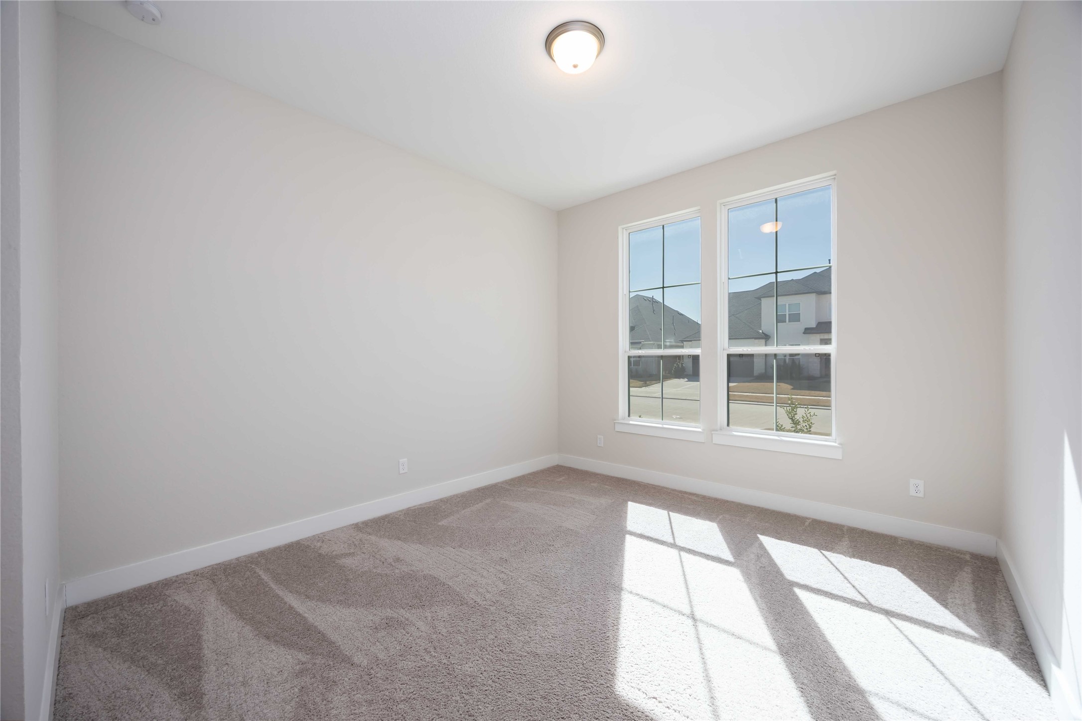32022 Western Grv Lane Fulshear, TX 77441 - Photo 7 of 49 a view of an empty room with a window