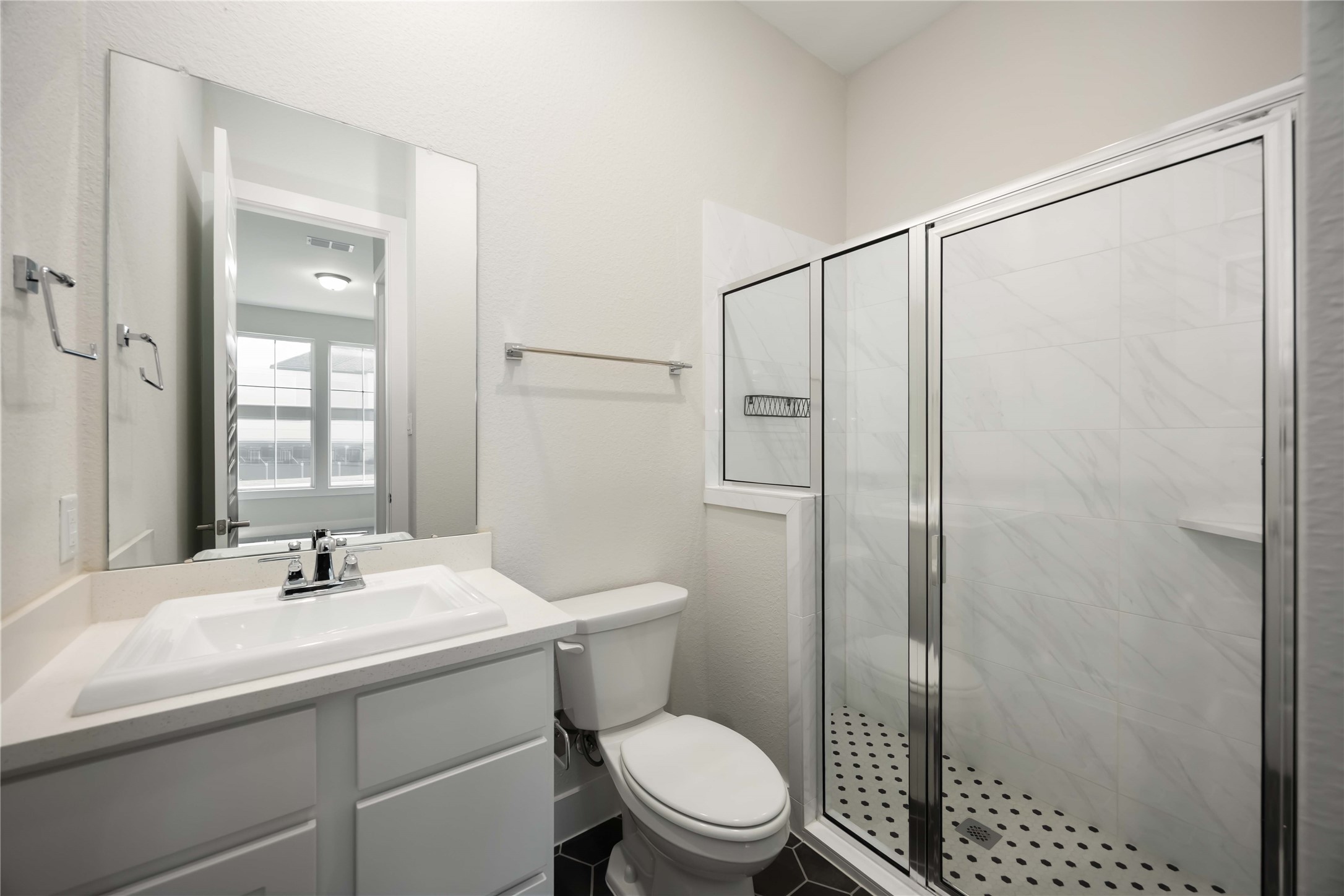 32022 Western Grv Lane Fulshear, TX 77441 - Photo 9 of 49 a bathroom with a sink toilet and shower