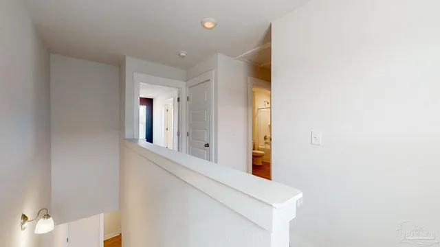 a view of a hallway with entryway