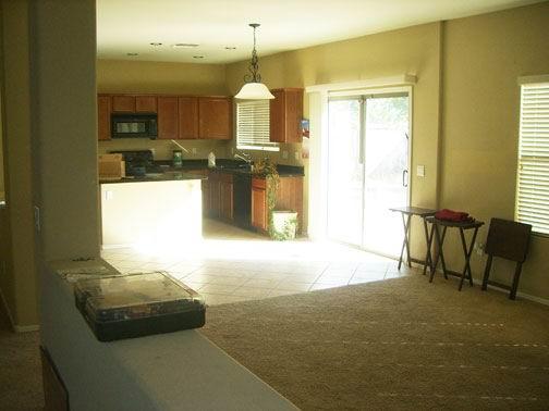 5915 West Trumbull Road Phoenix, AZ 85043 - Photo 3 of 4 Kitchen is open to the family room