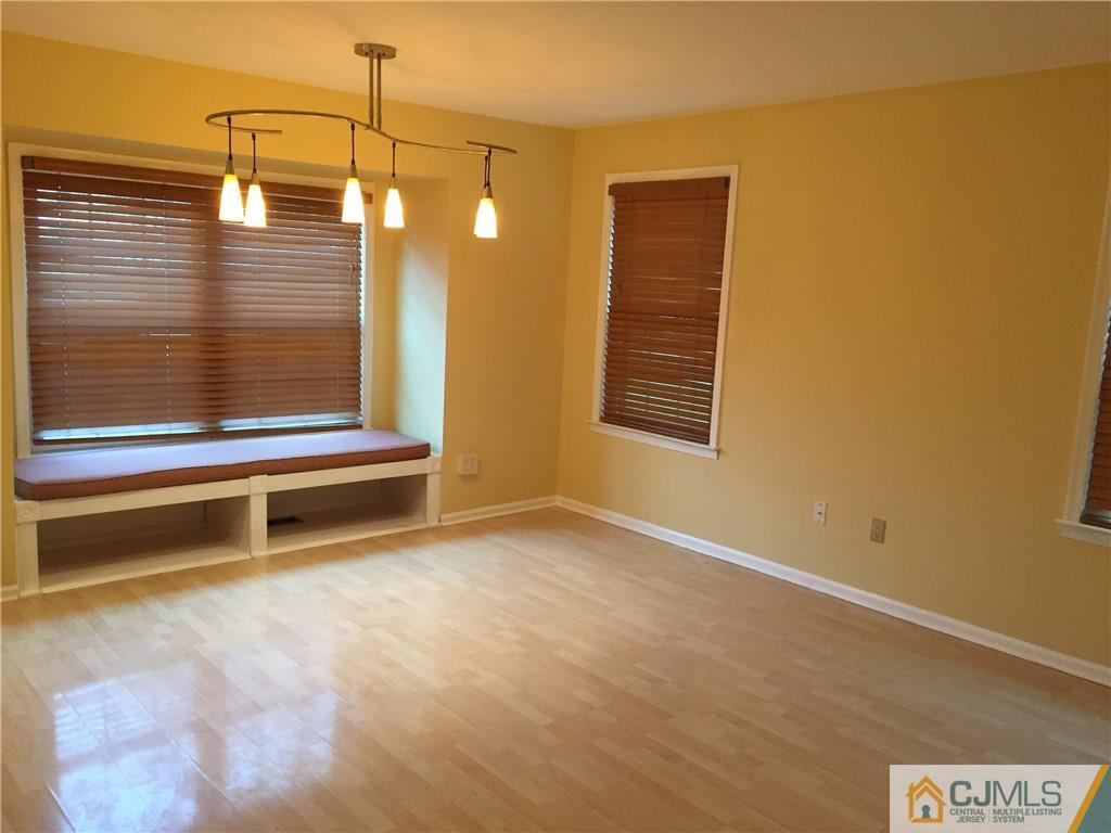 3401 Springbrook Drive Edison, NJ 08820 - Photo 4 of 21 a view of a room with wooden floor and window