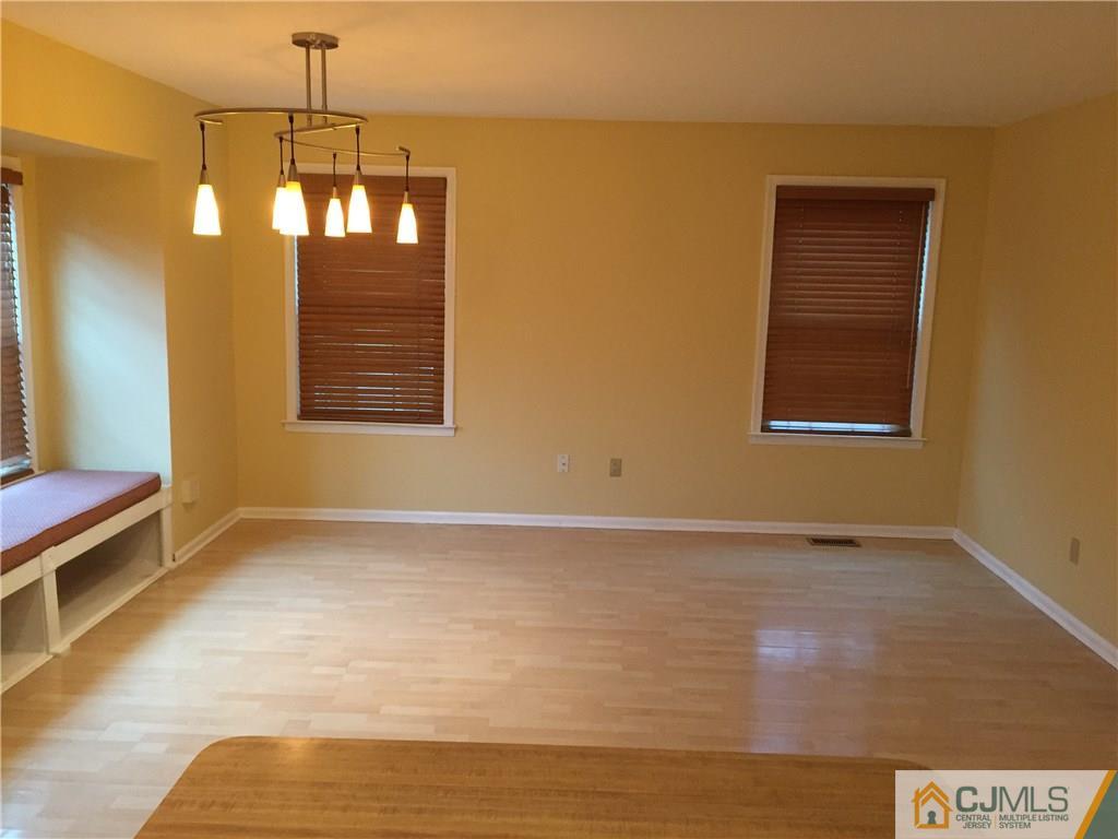 3401 Springbrook Drive Edison, NJ 08820 - Photo 7 of 21 a view of an empty room with a window