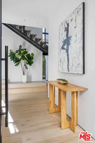 a white bath tub sitting next to a window