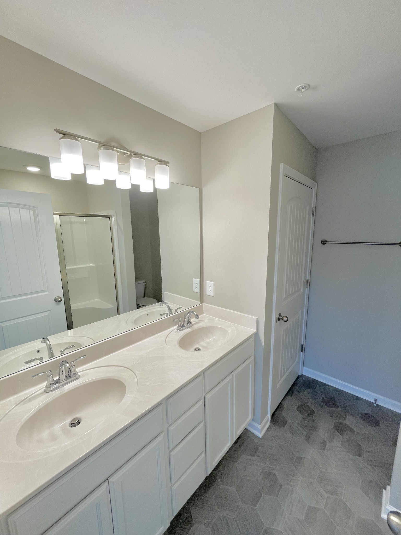 123 Addi Street Pleasant View, TN 37146 - Photo 13 of 13 a bathroom with a sink and a mirror