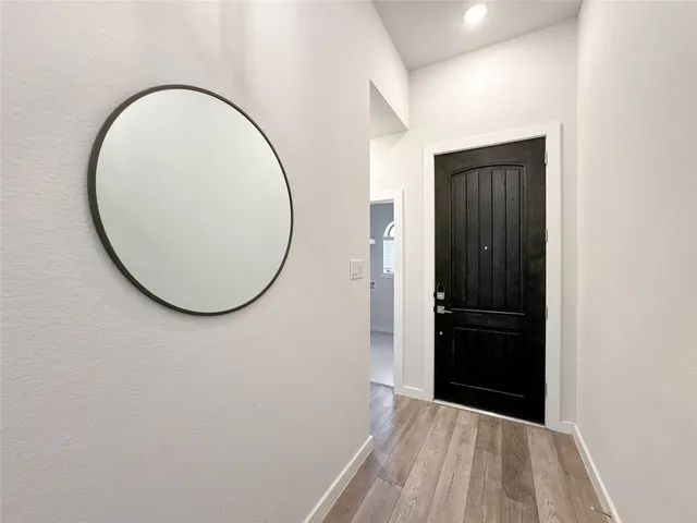 an entryway view with staircase