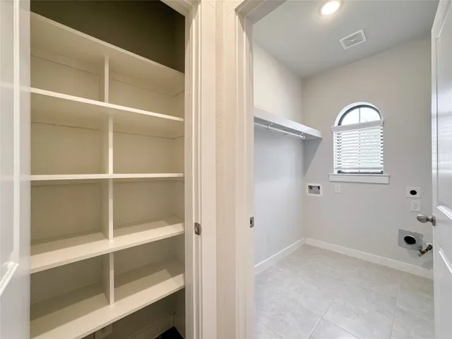 a view of a livingroom with a staircase
