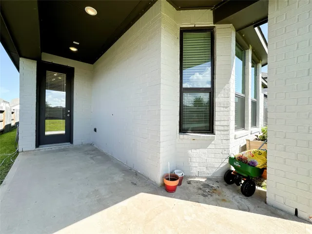 a view of a entryway door of the house and front door