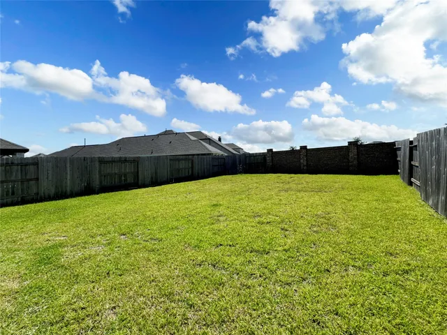 a view of a backyard with a garden