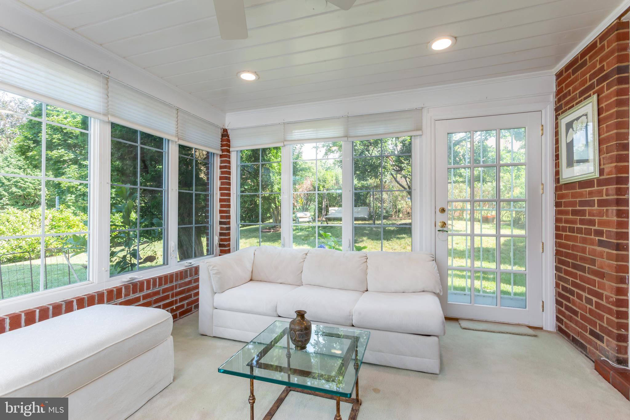 1505 Northgate Road Northwest Washington, DC 20012 - Photo 14 of 28 Sun Room leading to side yard