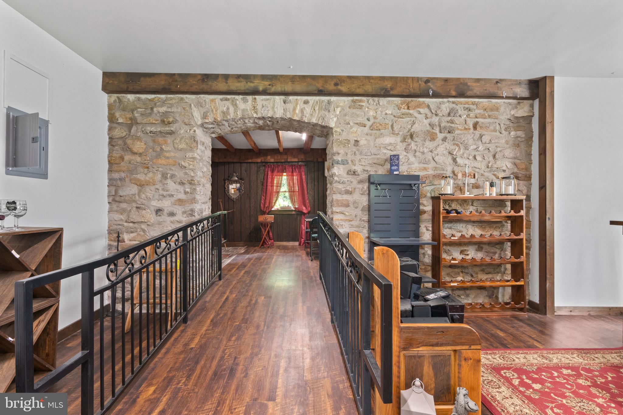 564 Blandon Road Fleetwood, PA 19522 - Photo 26 of 45 a view of a hallway with wooden floor and staircase