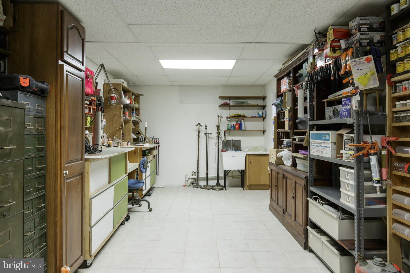 1101 Riverside Drive Salisbury, MD 21801 - Photo 48 of 56 Basement Workshop w/ Exterior Access to Patio