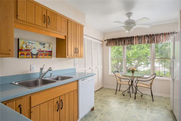 a kitchen that has a lot of furniture in it