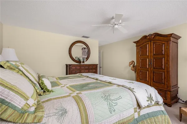 a bedroom with a bed and a closet