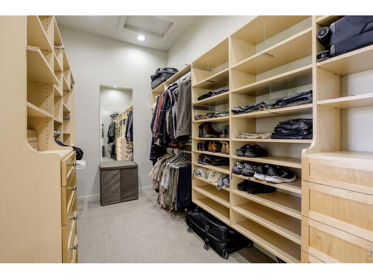 7550 Vardon Way Fort Collins, CO 80528 - Photo 19 of 29 a view of walk in closet with clothes and shoes