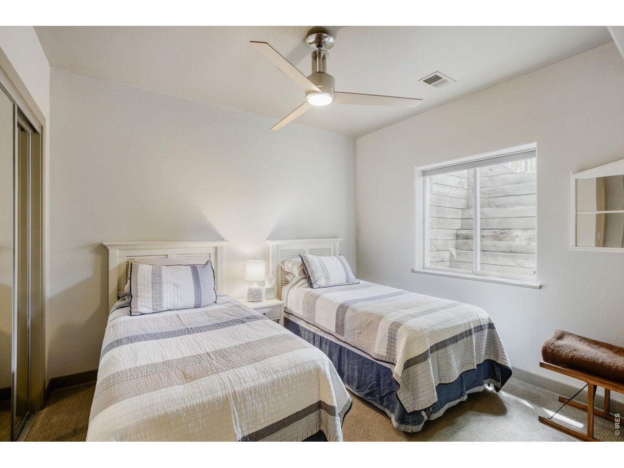 7550 Vardon Way Fort Collins, CO 80528 - Photo 28 of 29 a bedroom with bed and a window