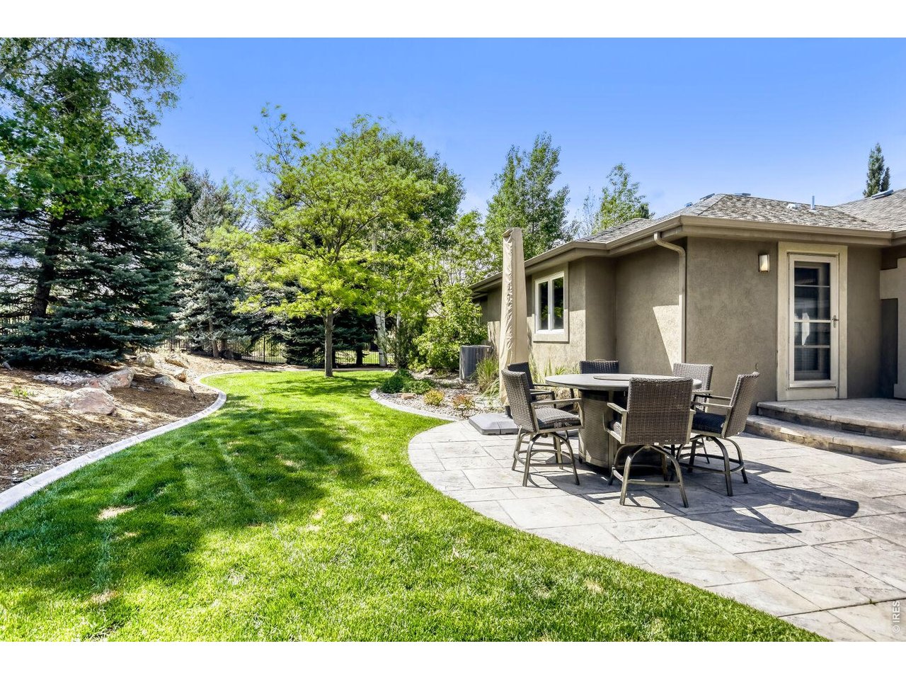 7550 Vardon Way Fort Collins, CO 80528 - Photo 5 of 29 a view of a house with backyard and sitting area