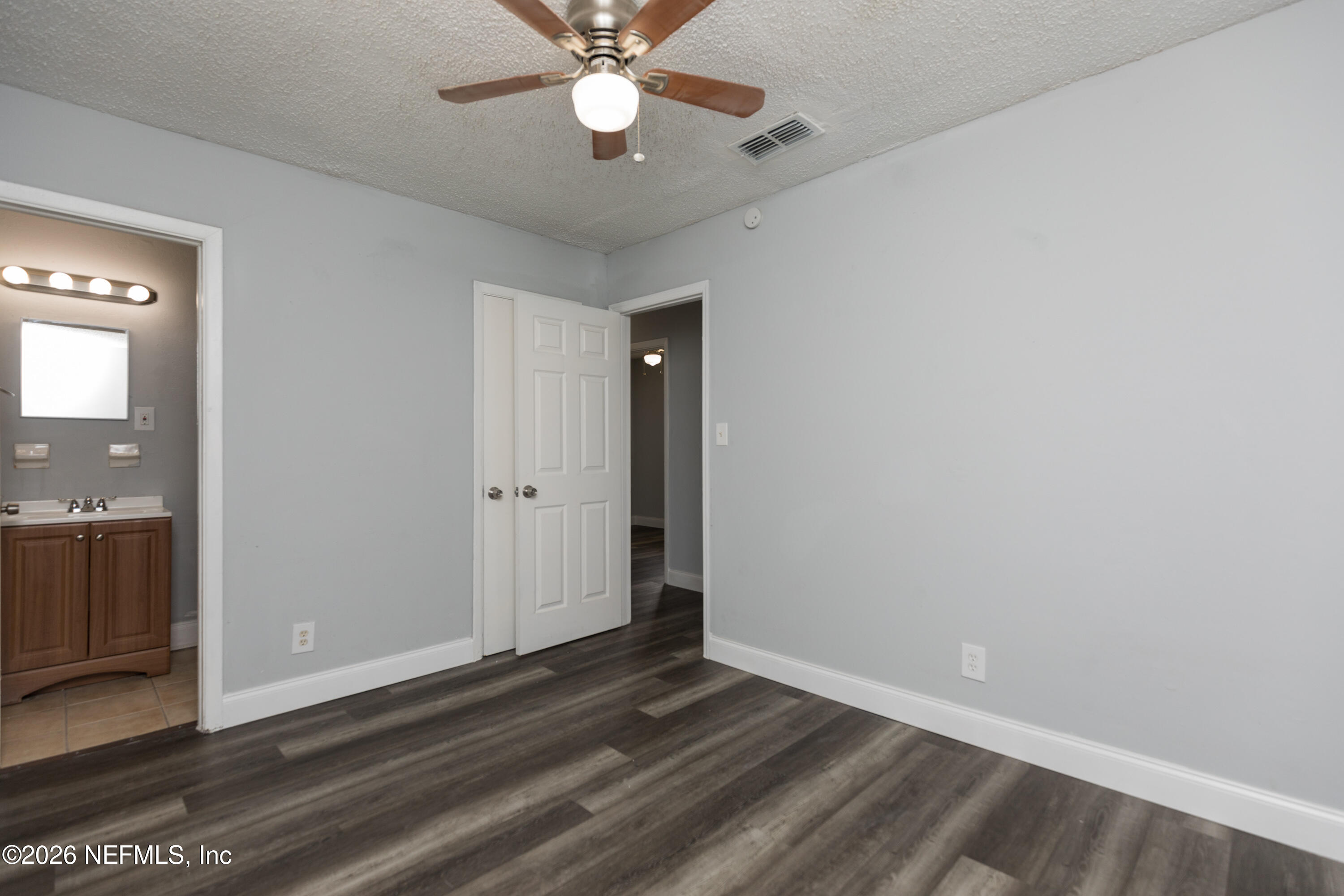 2255 West 13th Street Jacksonville, FL 32209 - Photo 23 of 29 wooden floor in an empty room