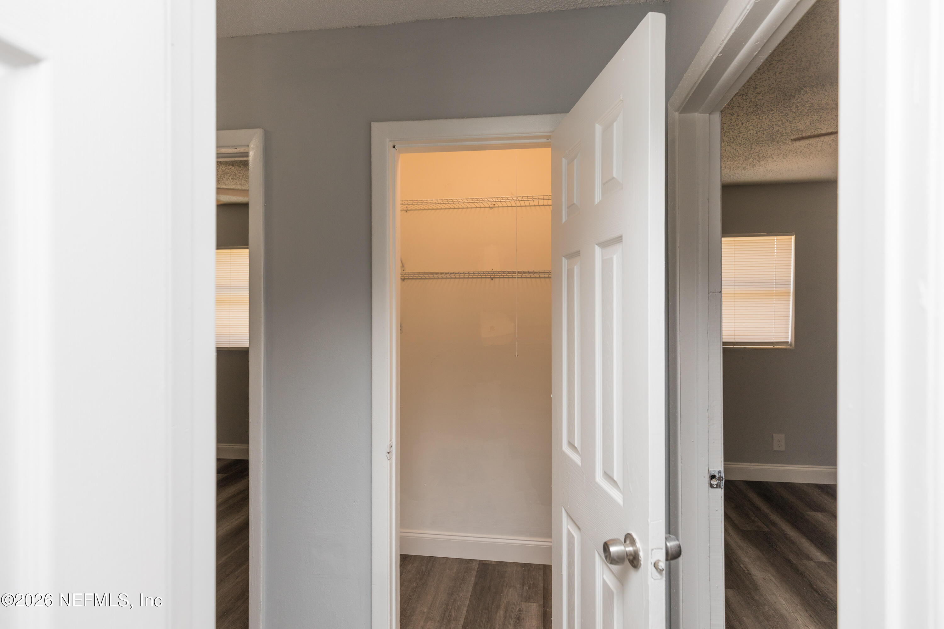 2255 West 13th Street Jacksonville, FL 32209 - Photo 24 of 29 a view of a hallway with a closet and a room