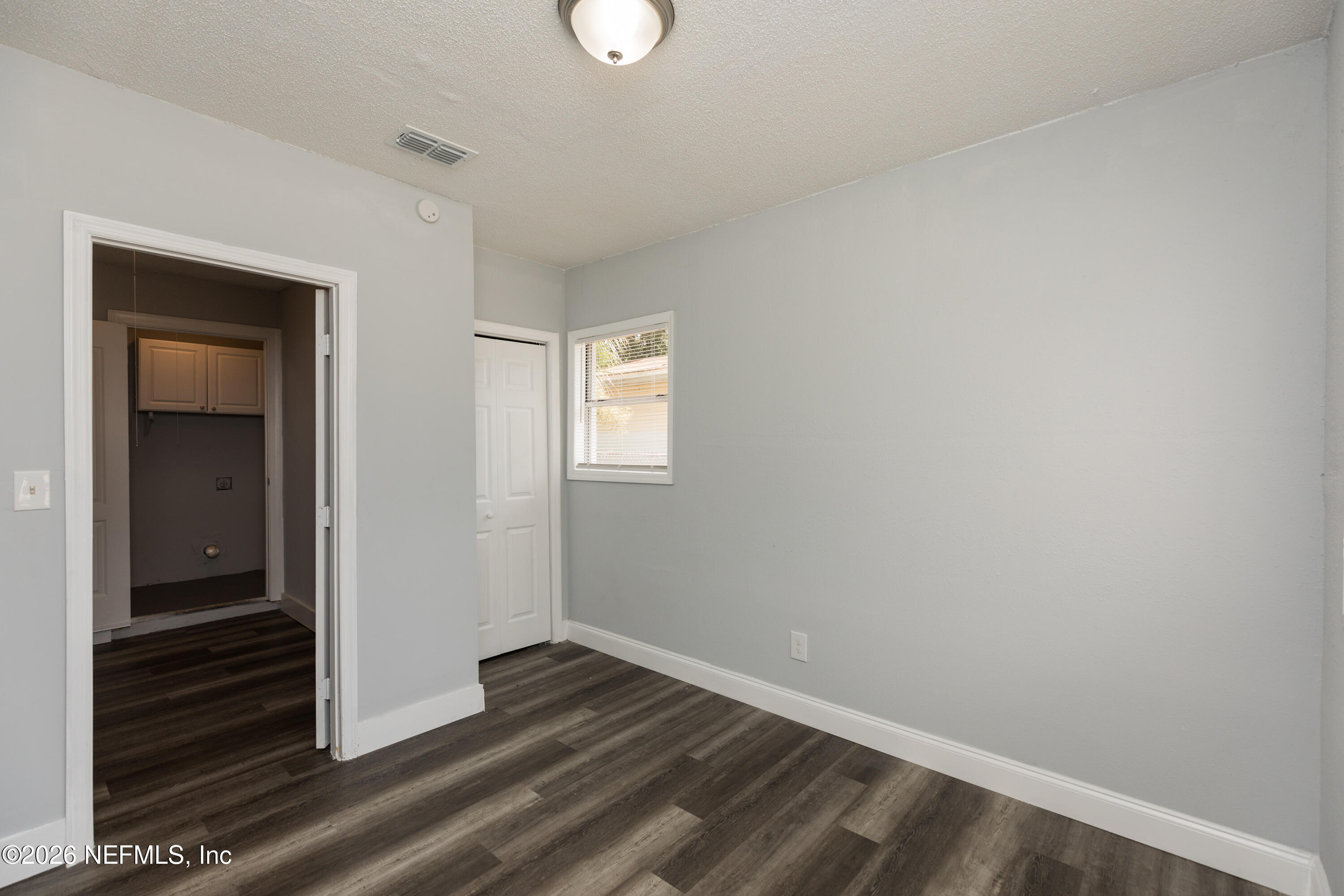 2255 West 13th Street Jacksonville, FL 32209 - Photo 25 of 29 wooden floor in an empty room