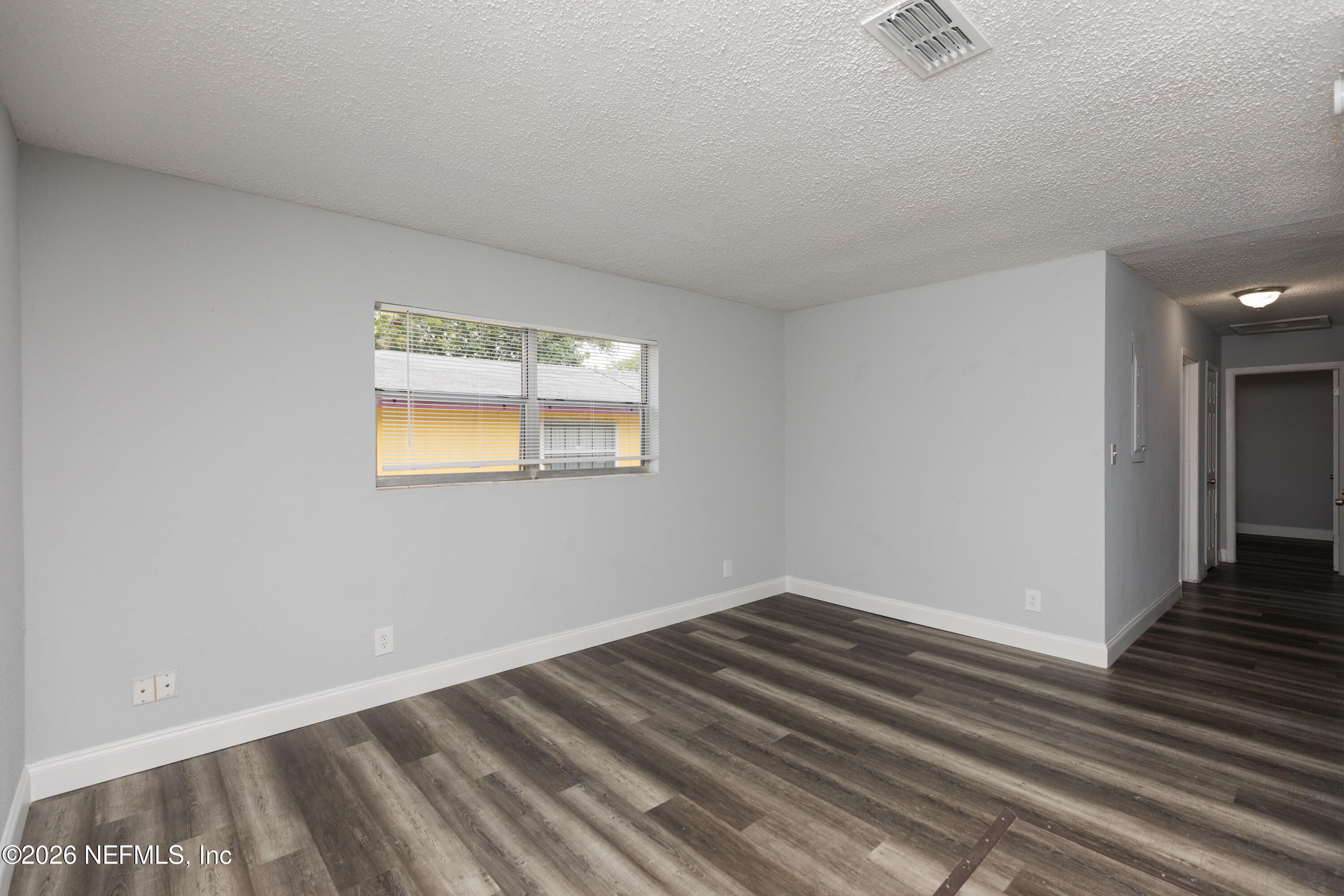 2255 West 13th Street Jacksonville, FL 32209 - Photo 10 of 29 a view of a room with wooden floor