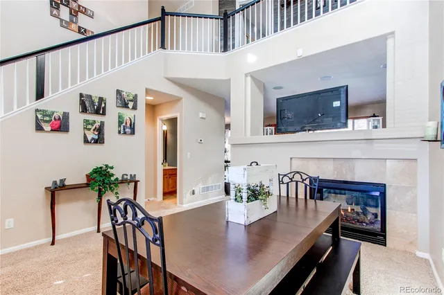 a view of dining room and kitchen