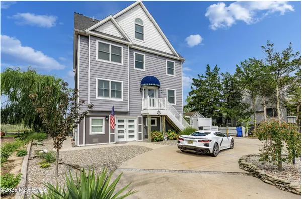 a car parked in front of a house