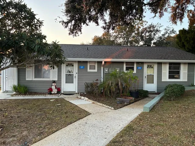 front view of a house with a patio