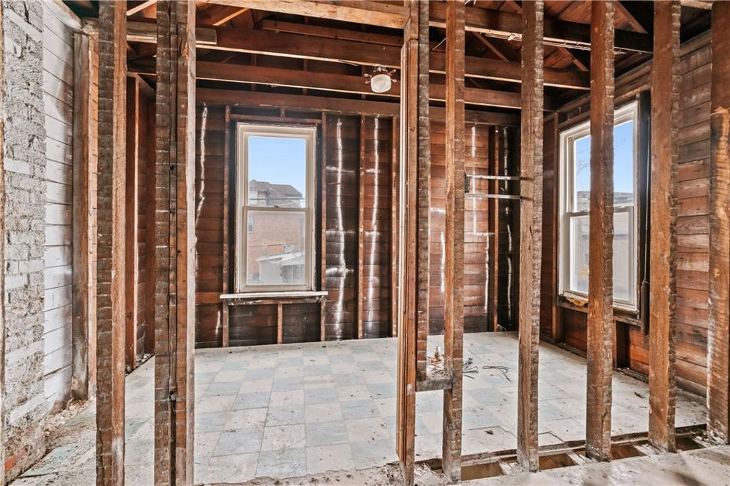 149 Murdock Street Canonsburg, PA 15317 - Photo 16 of 26 a view of a house with a floor to ceiling window and wooden floor