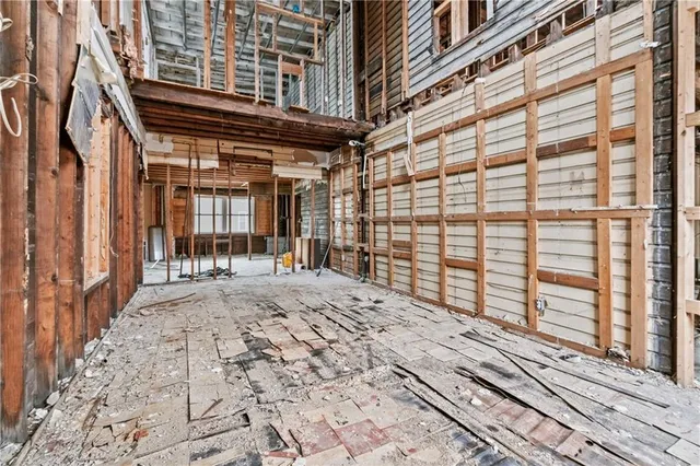 a view of a brick building with many windows