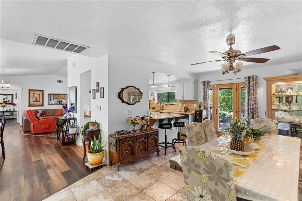 20071 Serrano Road Apple Valley, CA 92307 - Photo 14 of 38 a living room with furniture kitchen view and a large window