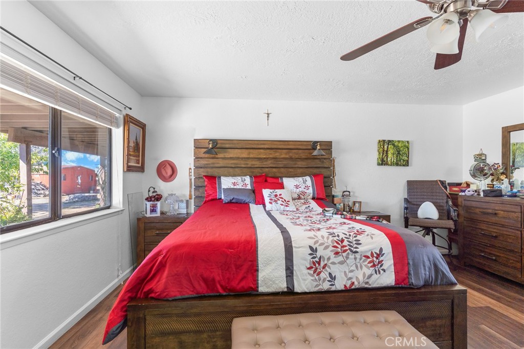 20071 Serrano Road Apple Valley, CA 92307 - Photo 27 of 38 a bed room with a bed and window