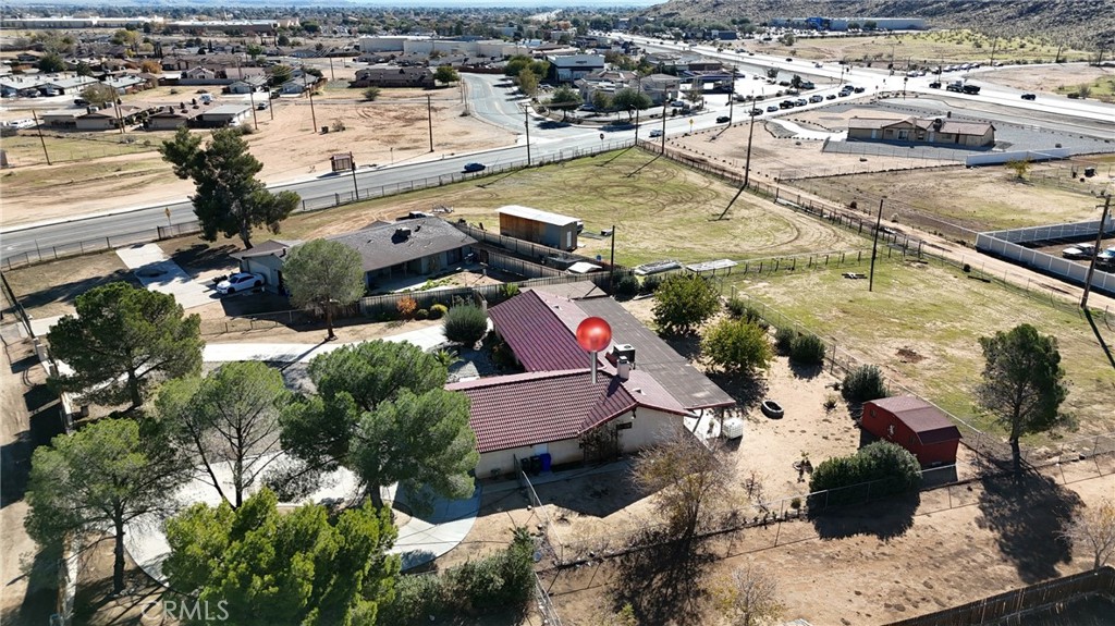 20071 Serrano Road Apple Valley, CA 92307 - Photo 31 of 38 an aerial view of residential houses with outdoor space