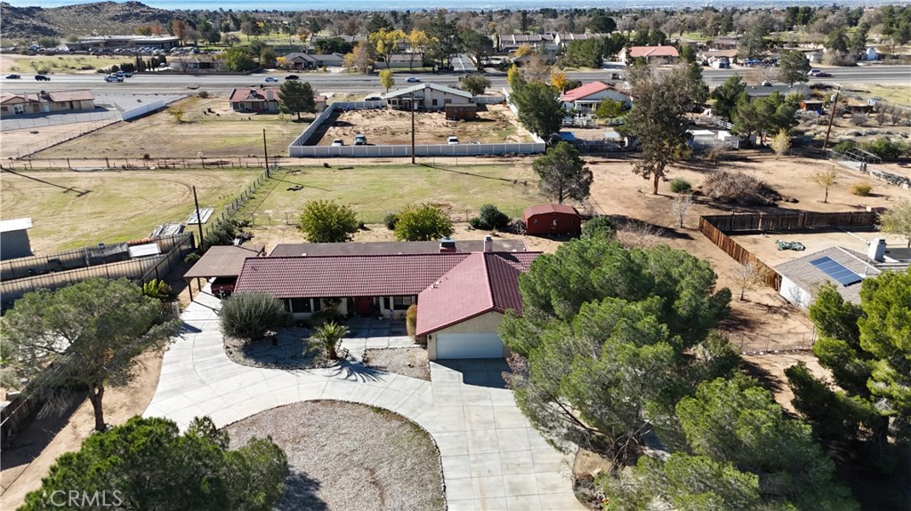 20071 Serrano Road Apple Valley, CA 92307 - Photo 32 of 38 a view of a houses with outdoor space