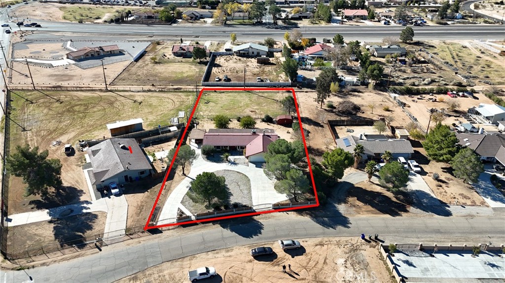 20071 Serrano Road Apple Valley, CA 92307 - Photo 37 of 38 an aerial view of a houses with outdoor space
